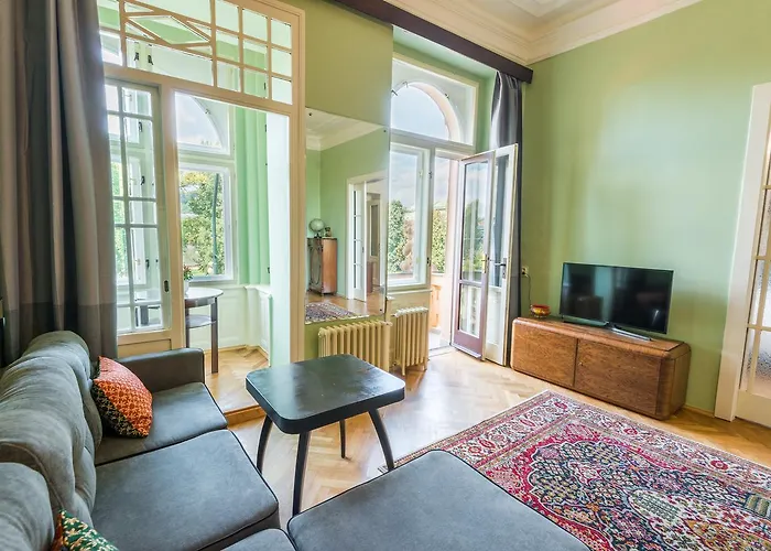 Riverside Apartment With A Balcony
